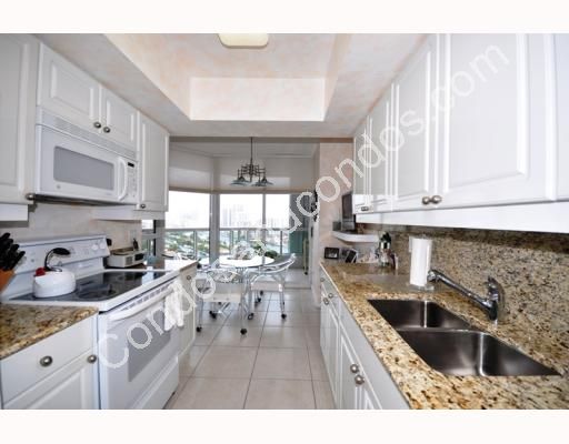 Kitchen with granite counter-tops and double sink