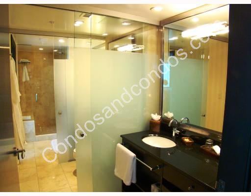 Bathroom with glass enclosed shower 