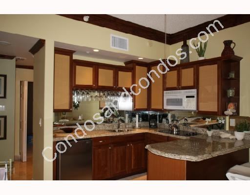 European kitchen with granite counter tops and breakfast bar