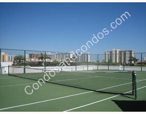 Lighted enclosed tennis court
