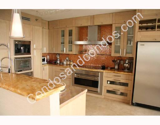 European kitchen w/granite countertops & stainless steel appliances