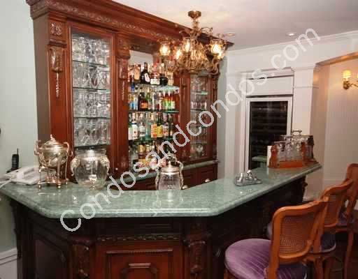 Regal private bar with marble countertops