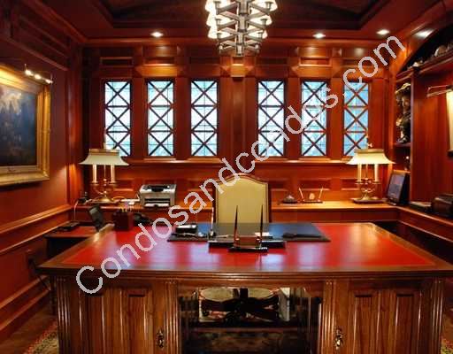 Opulent wood-paneled private office