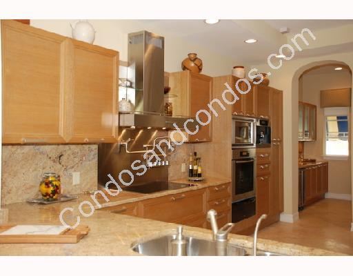 Kitchens include imported Italian cabinets and granite counters