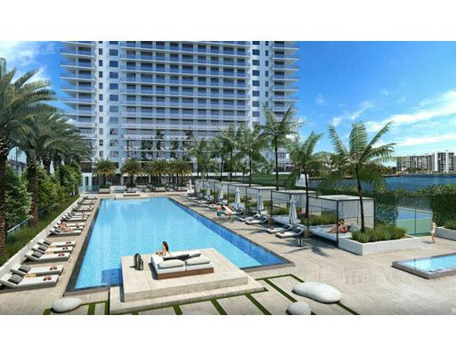 Expansive pool deck overlooking Intracoastal Waterway w/semi-private cabanas, lounge chairs, & infinity-edge pool