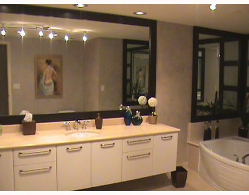 Elegantly appointed master baths include Snaidero cabinets & marble countertops



