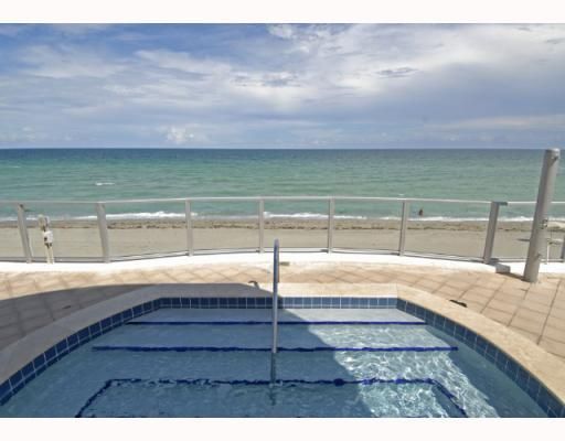 Outdoor Whirlpool Spa overlooking the beach and ocean from the pool deck
