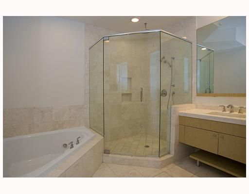 Bamboo wood, double sinks, oversized whirpool spa & frameless glass shower 