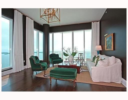 Grand room with breathtaking bay views surrounded by floor to ceiling windows