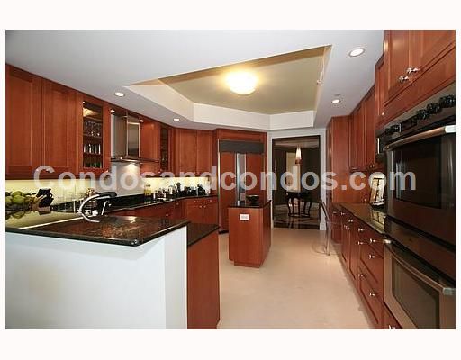 Kitchens with choice of solid wood cabinet doors, center islands, and granite counter tops 