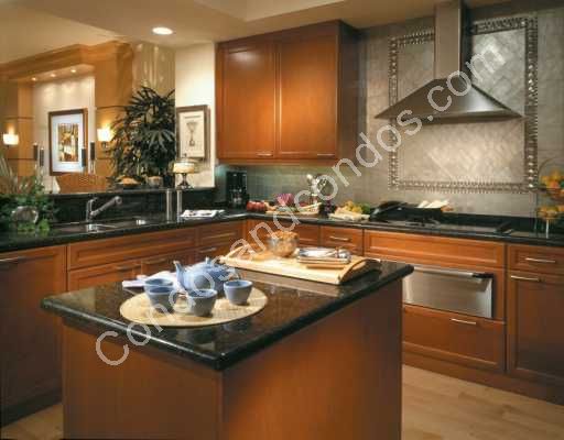 Kitchens contain utility islands and top-of-the-line appliances