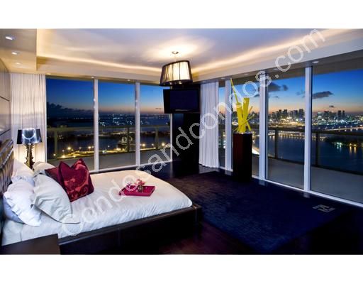 Panoramic water and cityscape views from master bedroom