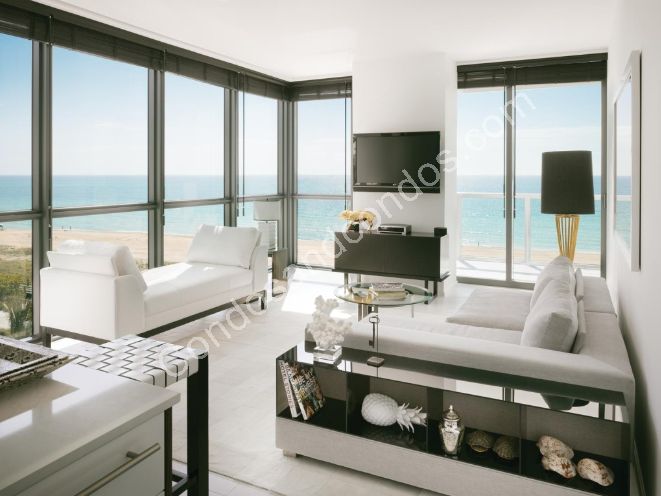 Living room with ocean view and floor-to-ceiling windows