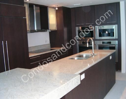 Kitchen with stainless steel appliances and island sink