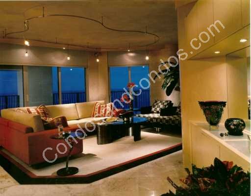Stylish living area with tinted energy saving solar glass windows & doors 