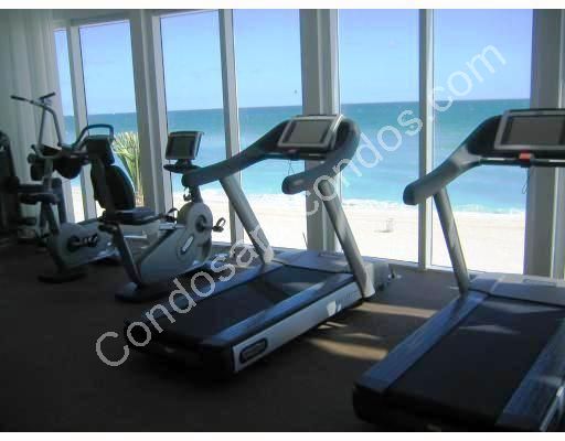 Fitness center looks out to the beach