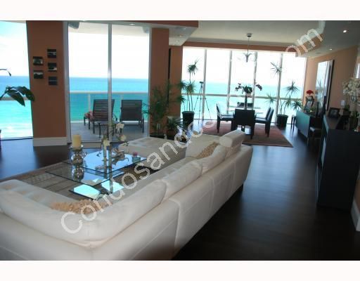 Open layout living/dining area with panoramic ocean view