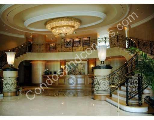Dramatic 2-story lobby with grand stairwell