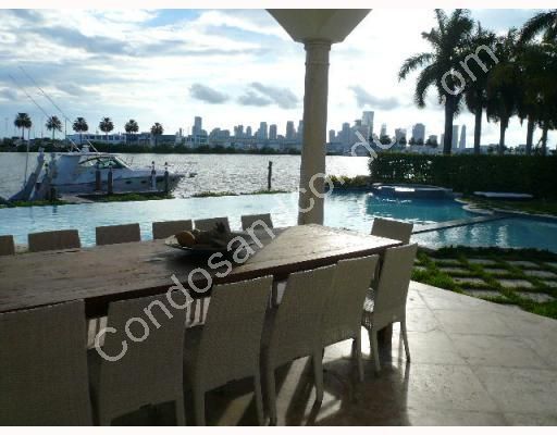 Amazaing outdoor Bayside dining area overlooking pool & private dock 