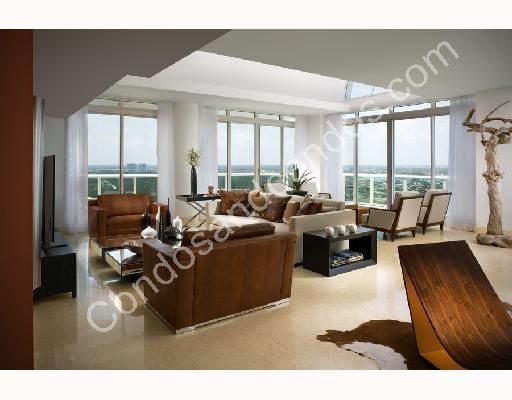 Living room with floor to ceiling windows 