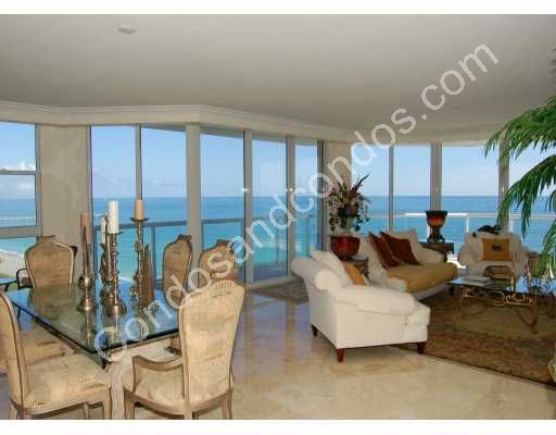 Opulent living/dining room and ocean backdrop