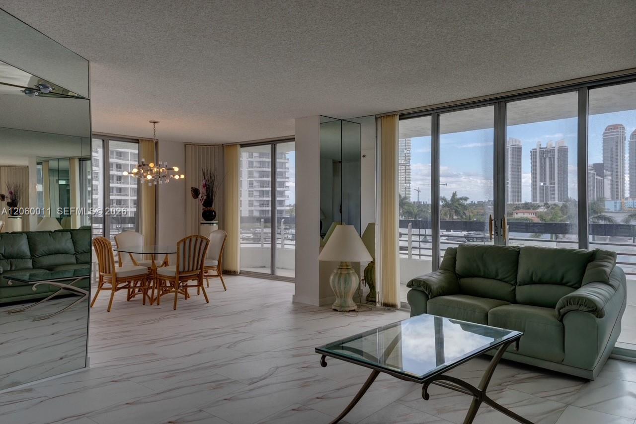Photo of 3600 Mystic Pointe Drive 613 #613 listing for Sale