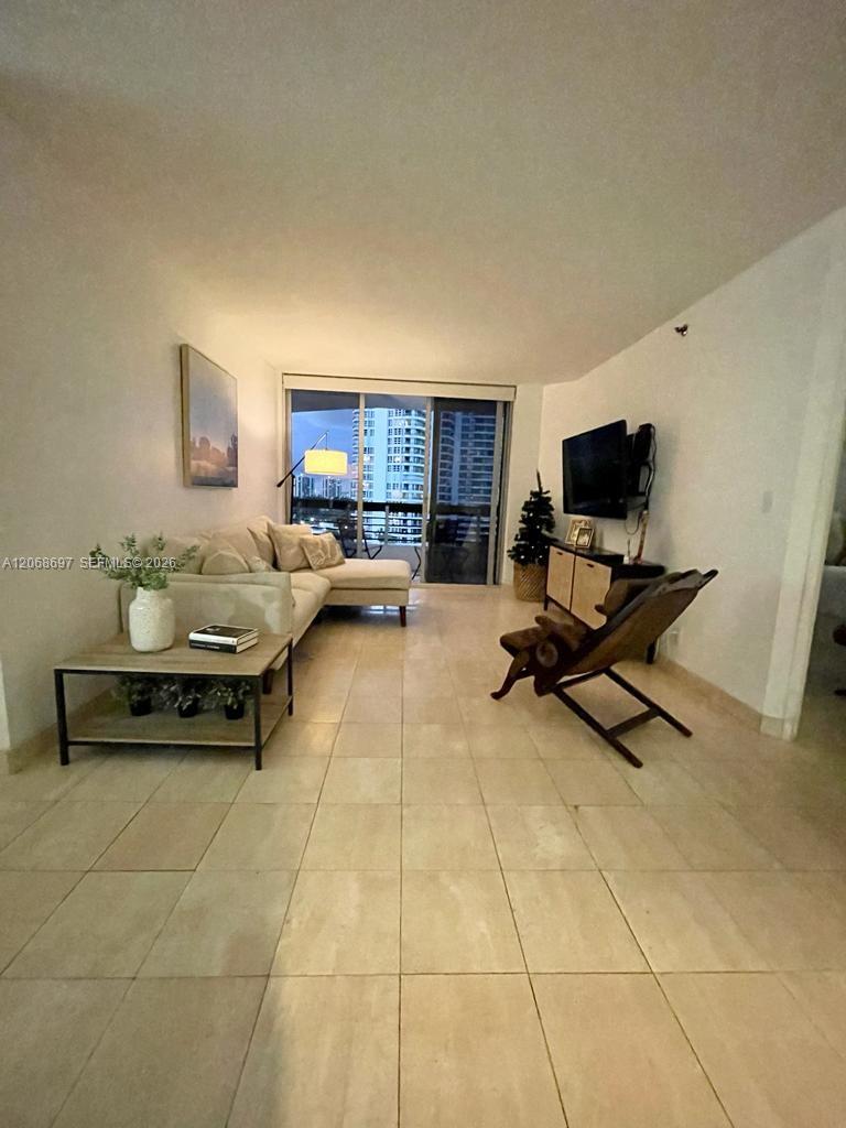 Photo of 3600 Mystic Pointe Drive 1010 #1010 listing for Sale