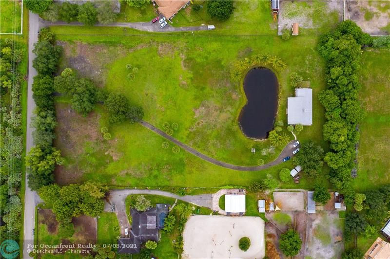 Aerial view of property- does not include barns or riding ring at bottom.