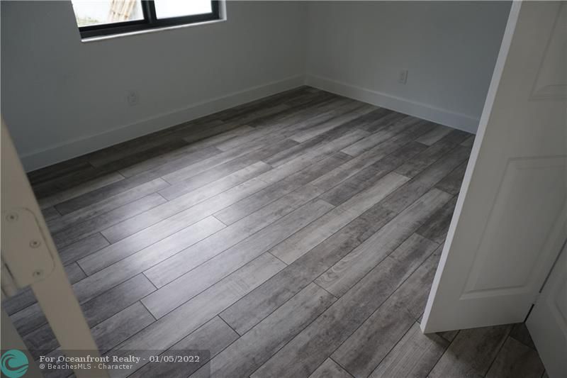 Typical bedroom floors with this builder. This is prior build in Dania, similar expected on Raleigh St builds.
