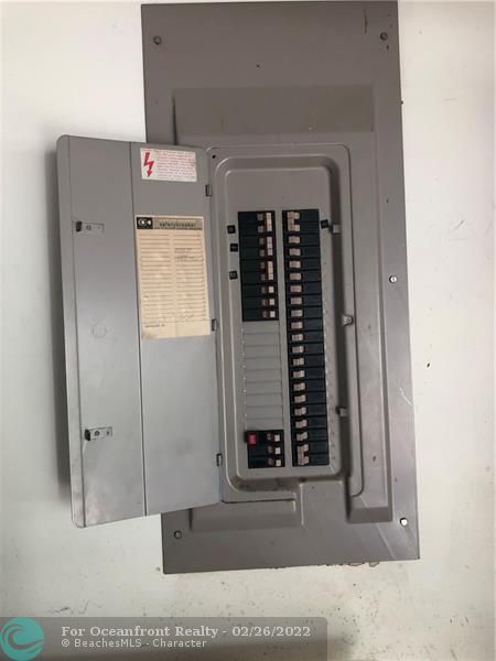 Upgraded electric service panel with room for additional breakers.