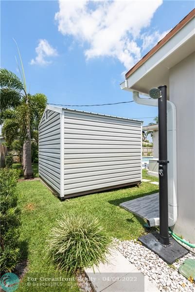 BACKYARD OUTDOOR SHOWER AND STORAGE SHED & HOME GENERATOR