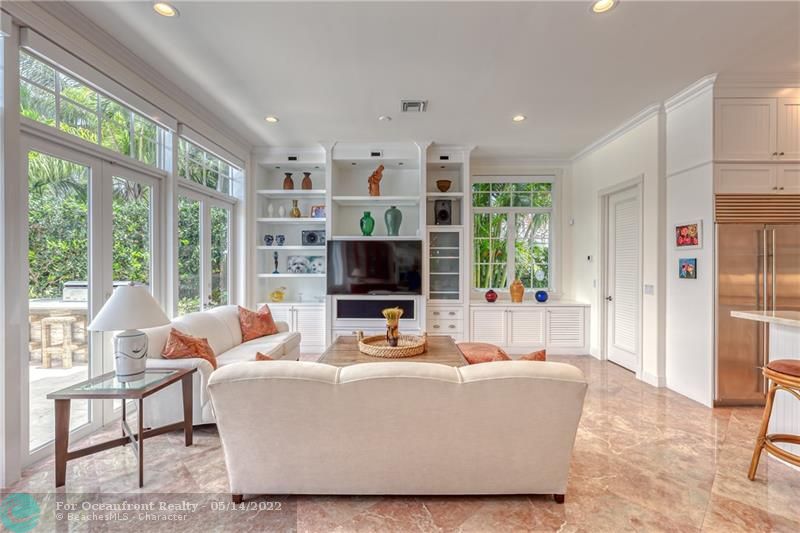 Gorgeous Family Room off of open kitchen with an abundance of natural light and water views