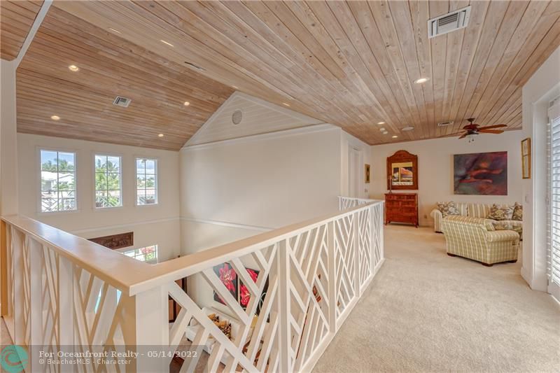 Great open upstairs loft area with wood ceilings