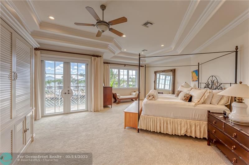 Large and spacious master bedroom with water views