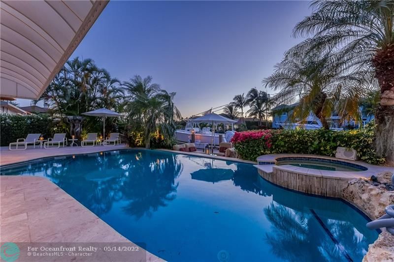 Enjoy South Florida evenings on the water poolside