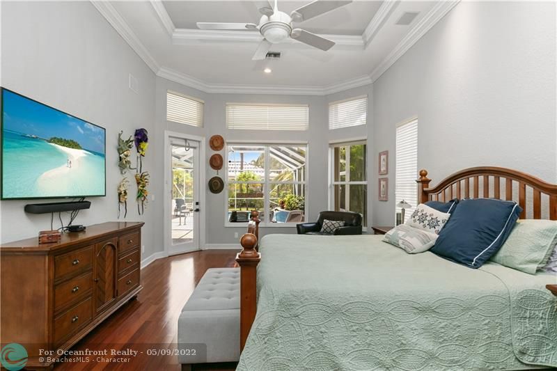 Spacious Primary Bedroom with Tray Ceiling