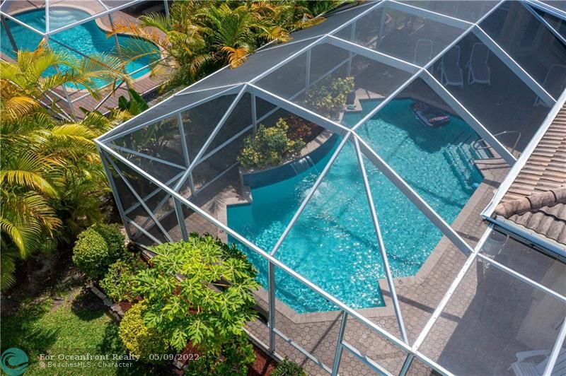 Huge enclosure over heated pool and patio