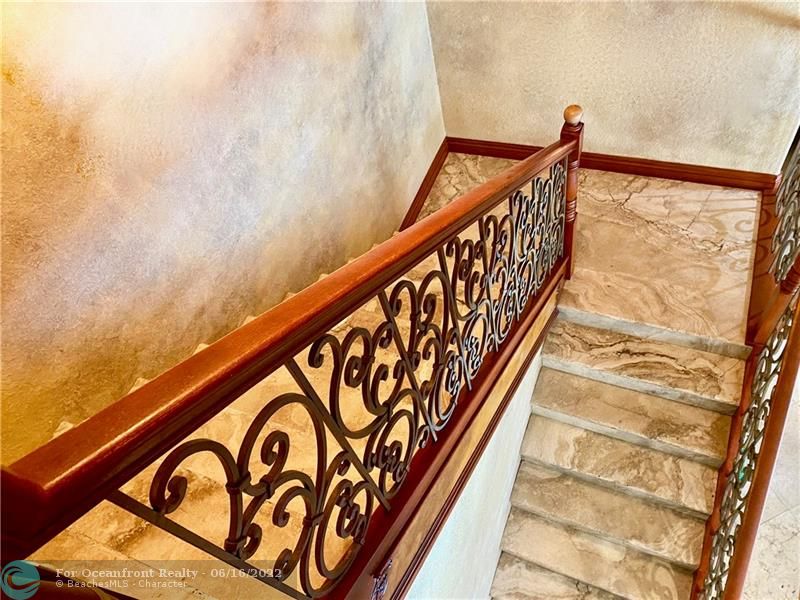 Custom Stairwell with Travertine Marble