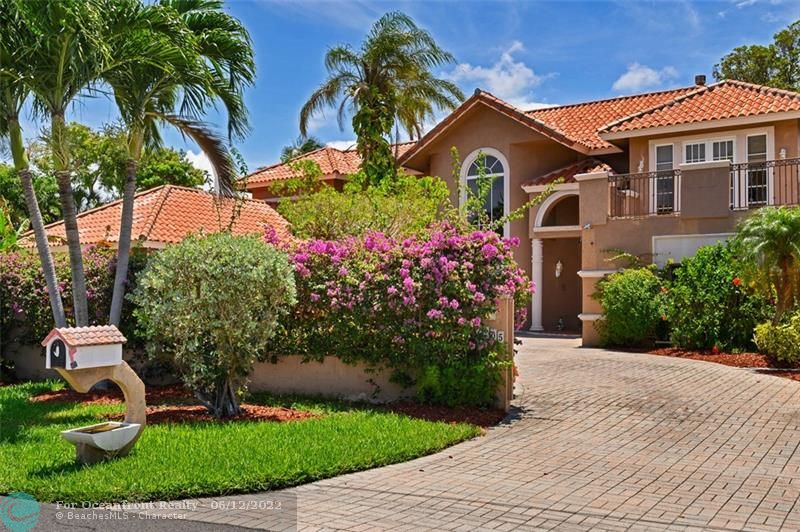 Beautifully landscaped with walled privacy!