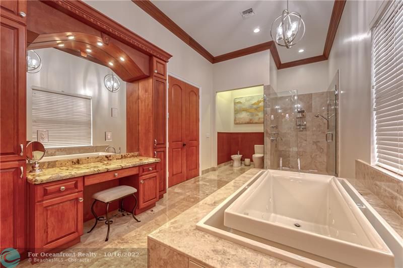 Marble Flooring & Wood Cabinetry, Bidet & Two Person Shower